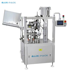 Plastic tube filling and sealing machine